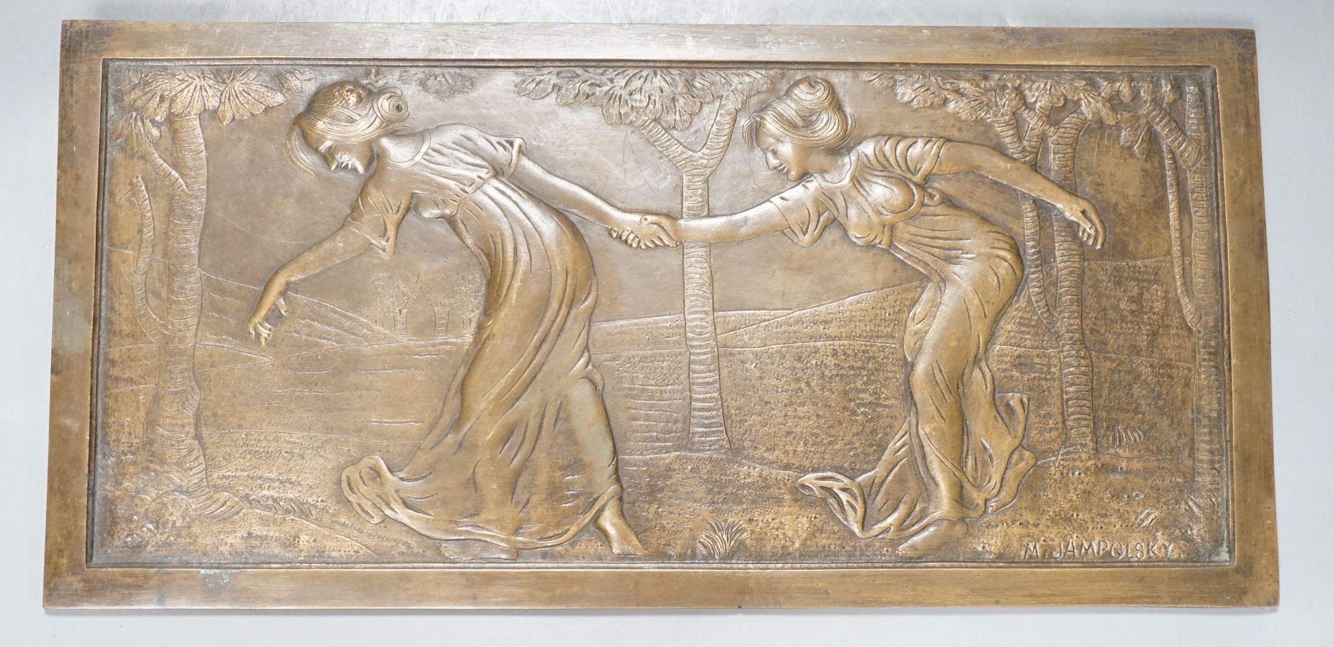 A signed M Jampolsky, Art Nouveau rectangular figural bronze plaque, 36.5 cms wide x 8 cms high.